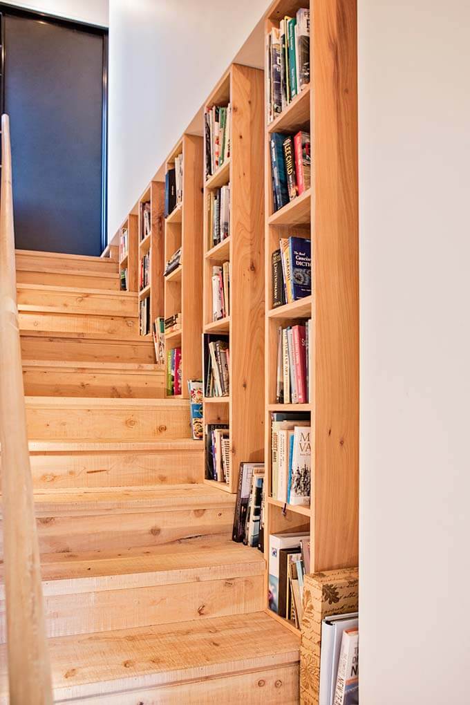 country-house-loft-stairway-bookcase