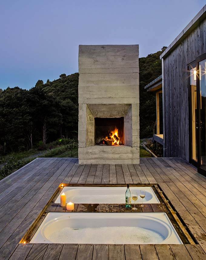 country-house-wood-deck-bathtubs-outdoor-fireplace