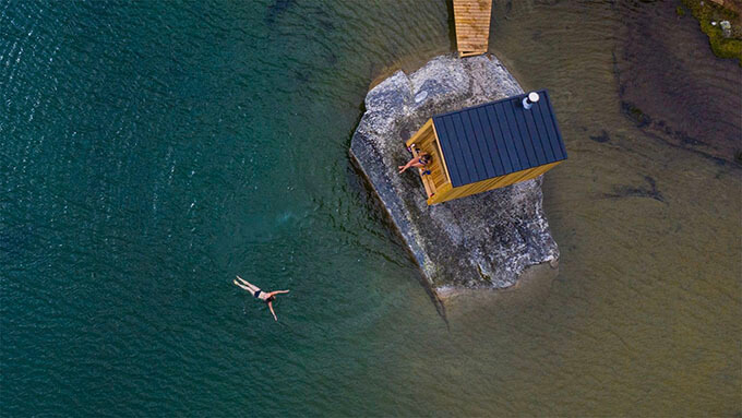 travel adventure lakeside sauna plunge aerial view