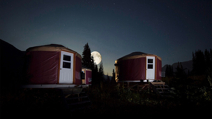 travel adventure sleeping yurts at night